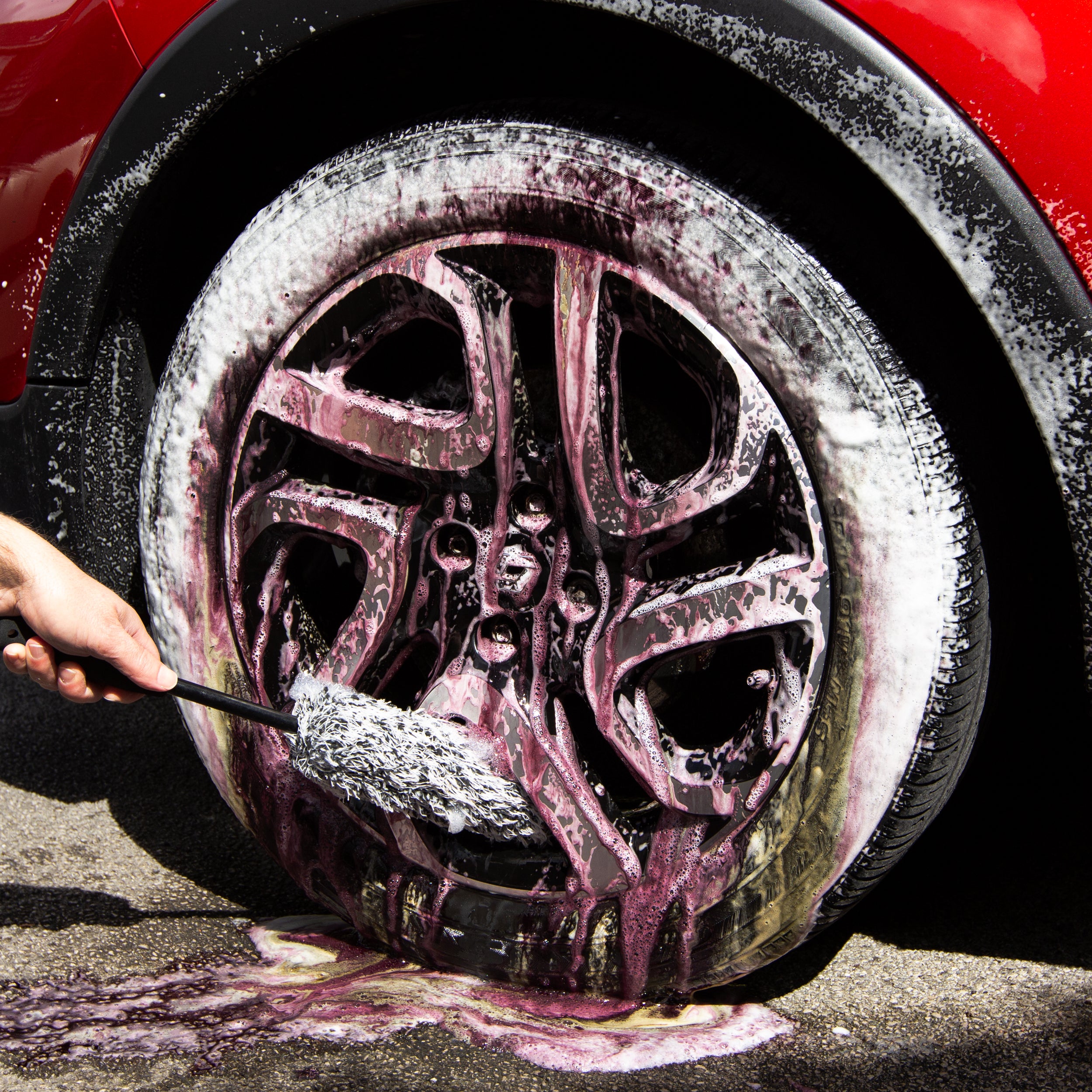 Gloss Fuel Iron Fallout Remover changing colour on a dirty alloy wheel
