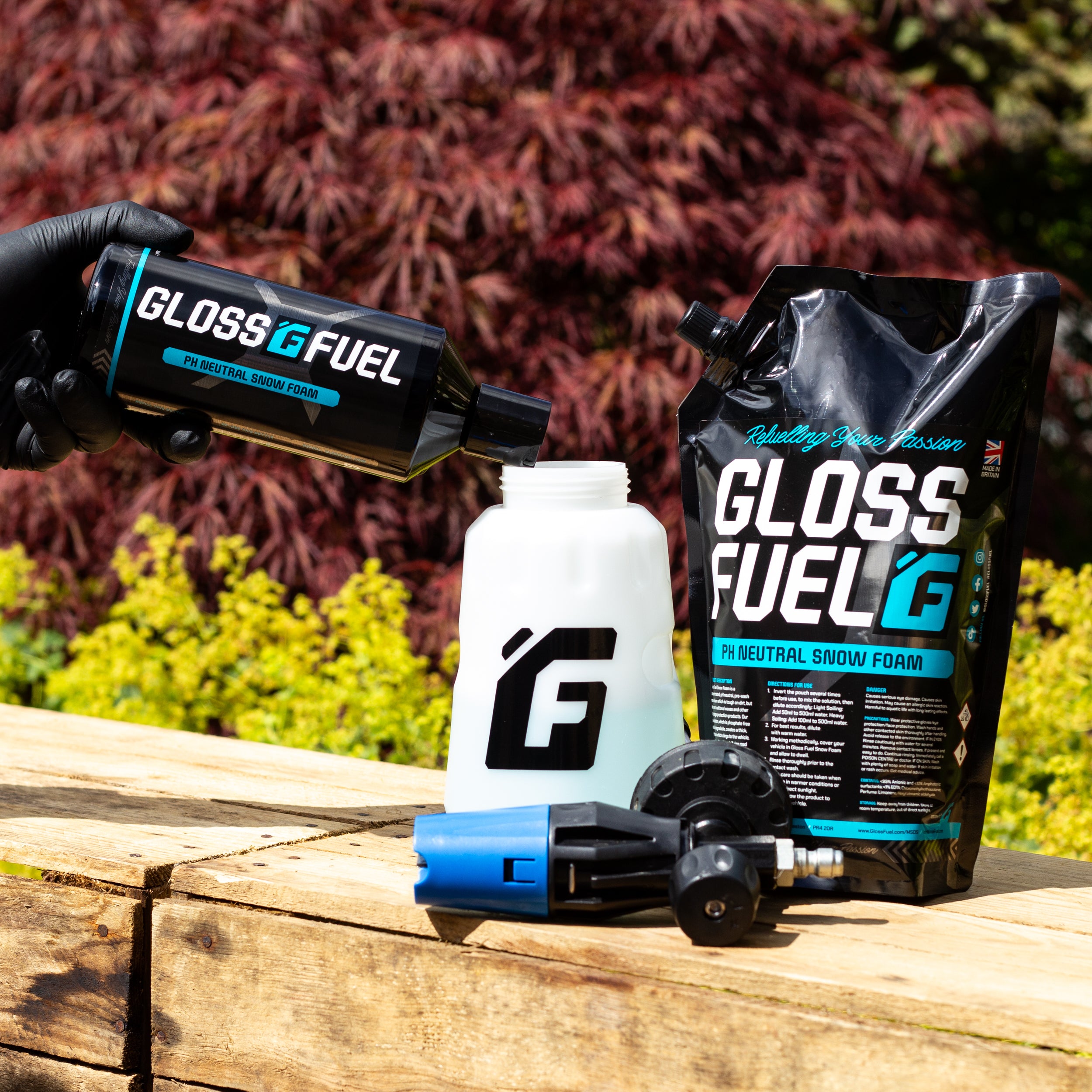 Gloss Fuel pH Neutral Snow Foam being poured into a Snow Foam Cannon Bottle