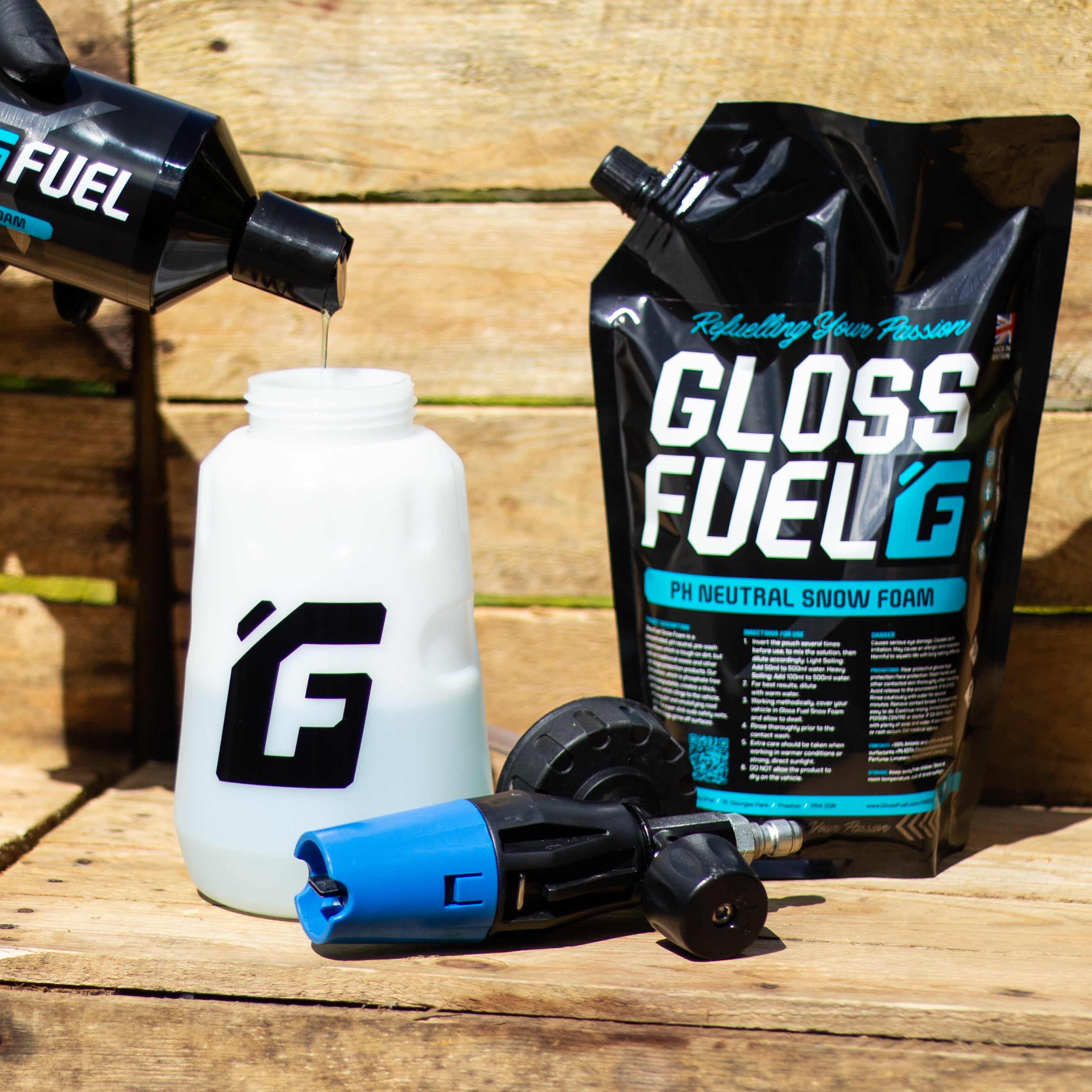 Gloss Fuel pH Neutral Snow Foam being poured into a Snow Foam Cannon with a 1 Litre Refuel Pack