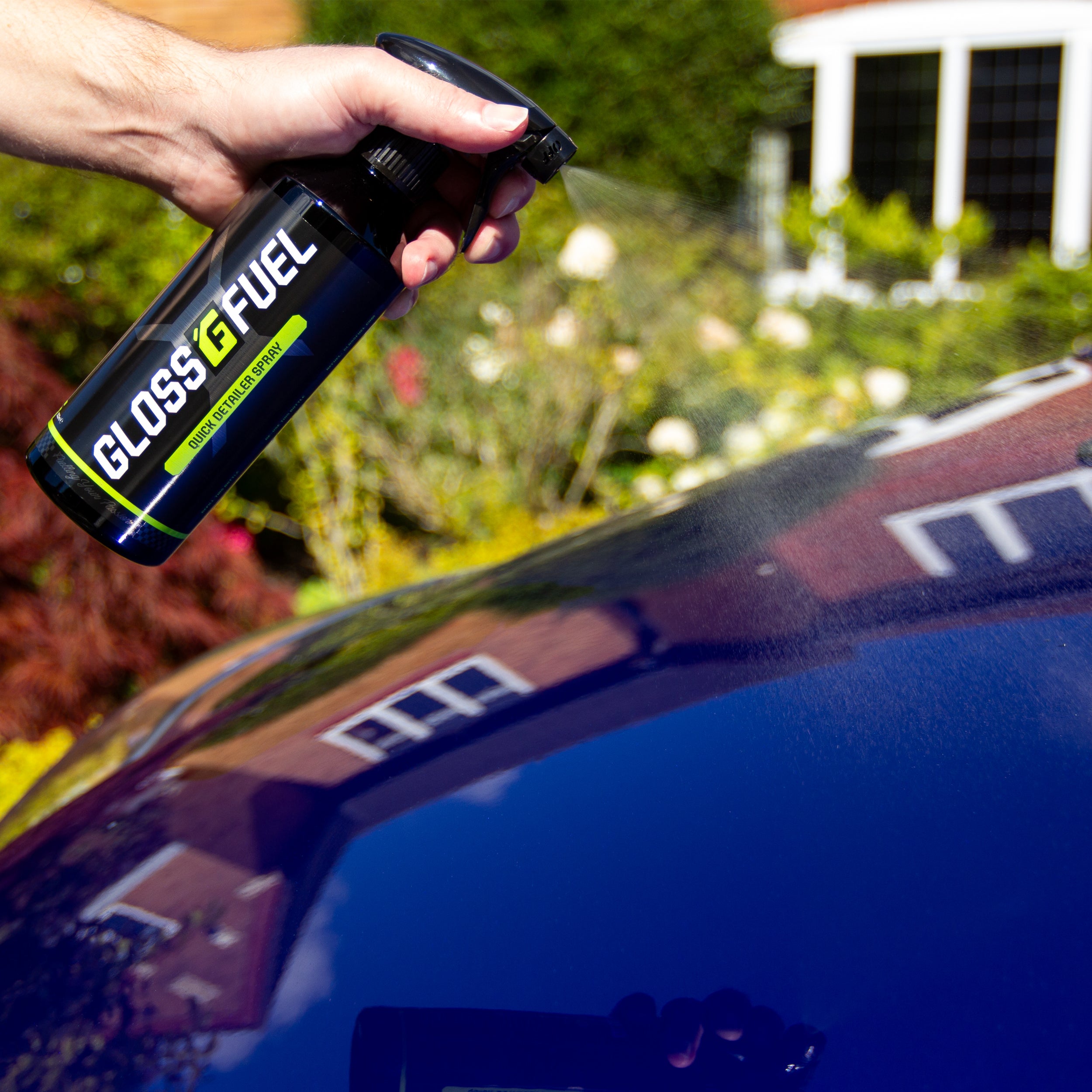 Gloss Fuel Quick Detailer Spray Trigger Spray Bottle misting Quick Detailer on a car body panel
